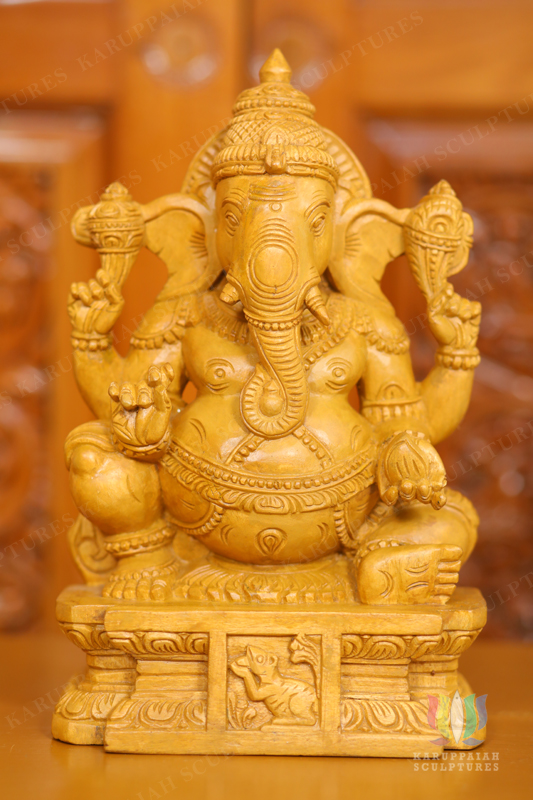 Wooden Vinayagar Seated statue Holding modak sweet