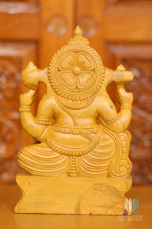 Wooden Vinayagar Seated statue Holding modak sweet