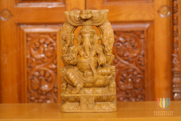 Wooden Vinayagar Statue Seated With Brabavali