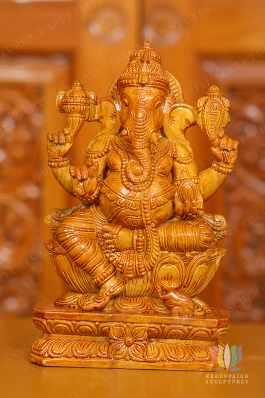 Wooden Vinayagar Statue Seated Holding modak sweet