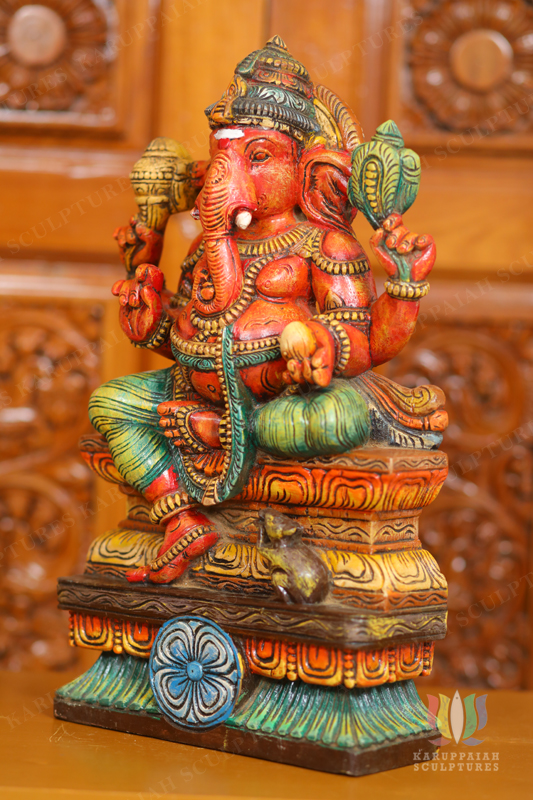 Wooden Painting Vinayagar Statue Seated Holding modak sweet