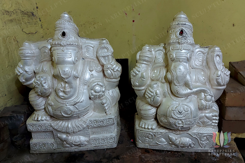 Vinayagar silver kavachams after heating and dipping in a mixture of water and Sulphur