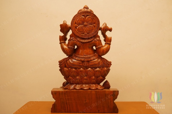 Wooden Ganesh Seated Holding modak sweet 22″